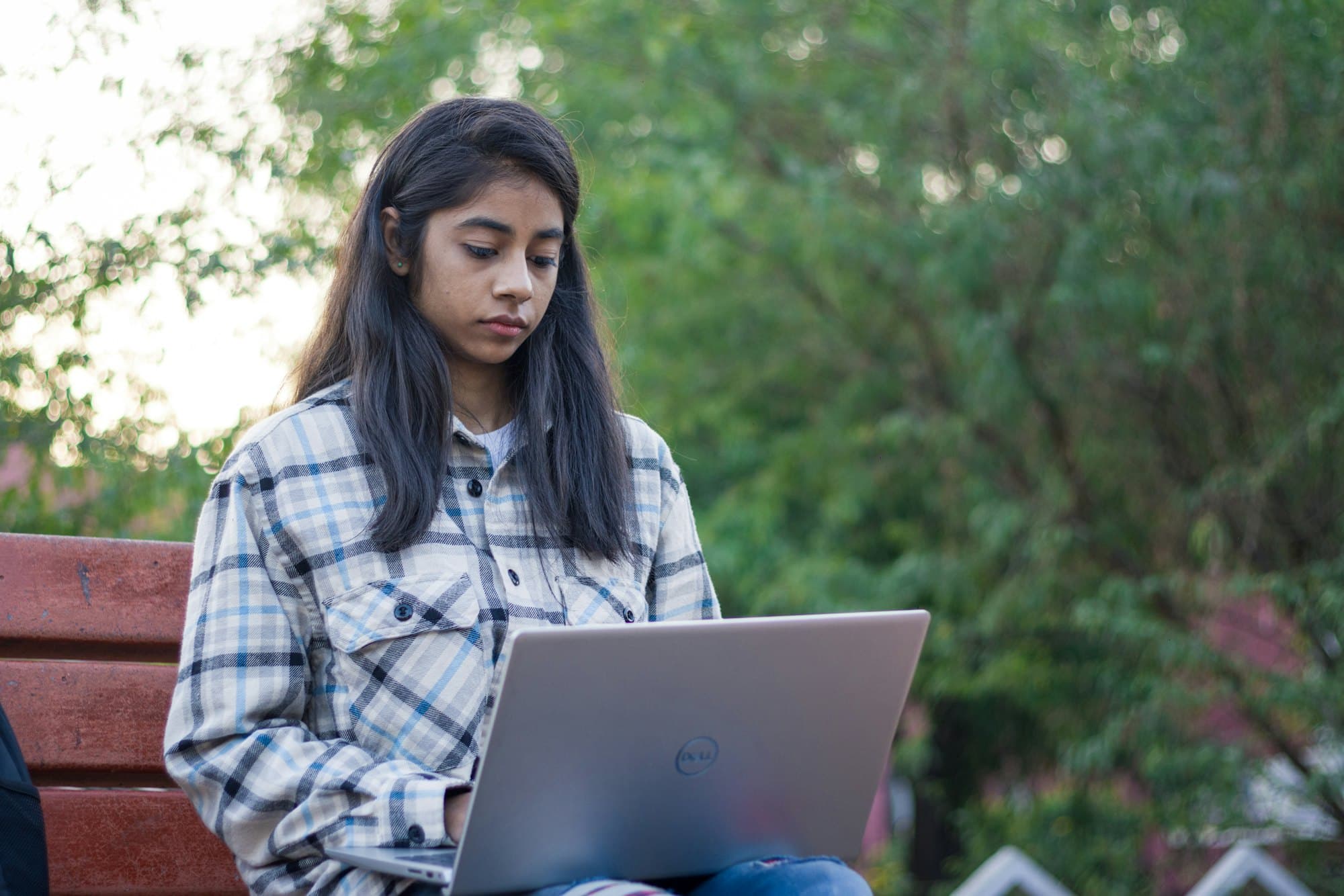 Learner studying on a laptop